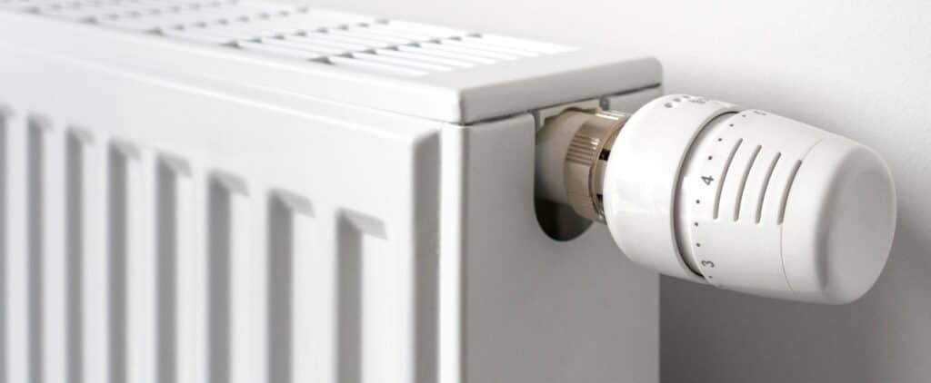 Close-Up Of Thermostatic Radiator Valve / Tvr Fitted To Household Hot Water Heating System Radiator To Control The Temperature Of A Room